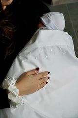 Drap naissance brodé pois