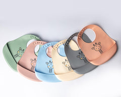 Bavoir en silicone avec poche Girafe