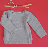 Pull gris avec étoile