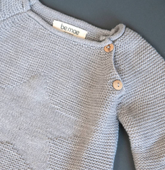 Pull gris avec étoile